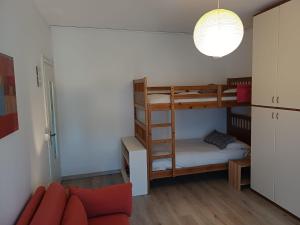 Postel nebo postele na pokoji v ubytování Casa Graziella, Borno Ospitar