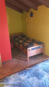 コーリコにあるhome in residenceのベッドルーム1室(ベッド1台付)