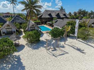 an aerial view of a resort with a playground at Juana Ocean Villas in Makunduchi