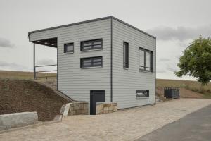 a small house on top of a hill at Eat and Stay in Bad Salzungen
