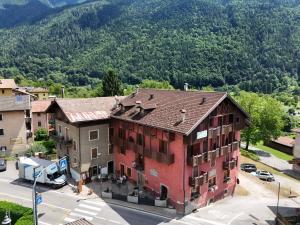 an aerial view of a building in the mountains at Albergo Locanda Mezzosoldo in Mortaso