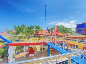 a view of a water park with a roller coaster at Pirate Galeon Resort in Carcar