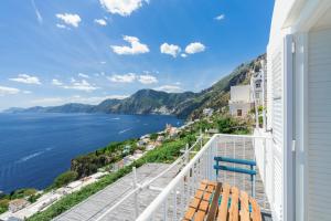 a balcony with a view of the ocean at Calante Luna in Praiano