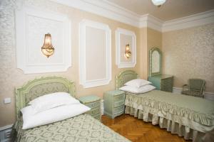 Posteľ alebo postele v izbe v ubytovaní Art Apartments Celakovskeho Sady