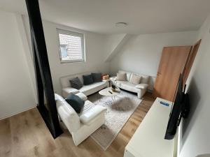 Posezení v ubytování 3 Zimmer Wohnung am See in Lehrte