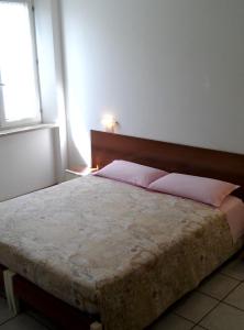 Posteľ alebo postele v izbe v ubytovaní Bed & Breakfast Bompadre