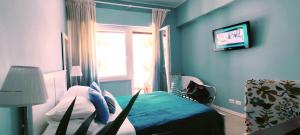 Televisyen dan/atau pusat hiburan di 120 Rodionoff B&B - connection with Airport and Mondello Beach