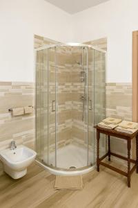 a bathroom with a shower and a sink at Borgo nel Vigneto in Erbusco