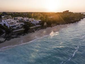 an aerial view of a beach at sunset at Nungwi Dreams by Mantis in Nungwi