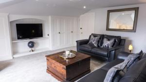 Et opholdsområde på The Penthouse Self Catering