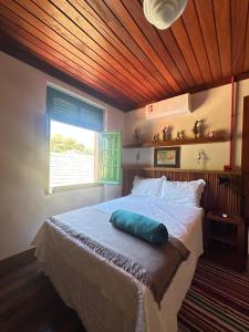 Postel nebo postele na pokoji v ubytování Residencial João Nunes Netto