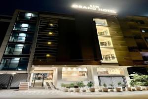 a store front of a building at night at HR Grand Hotel in New Delhi