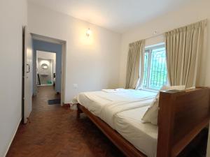 Ένα ή περισσότερα κρεβάτια σε δωμάτιο στο Meadows Mountain Villa