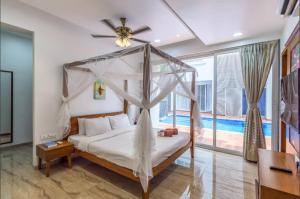 Postel nebo postele na pokoji v ubytování Aveda Juniper Resort