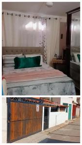 a bedroom with a bed with a green pillow on it at Meu cantinho in Tiradentes