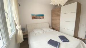 Postel nebo postele na pokoji v ubytování Ty inizi - Maison avec piscine