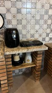 Η κουζίνα ή μικρή κουζίνα στο Apartamento Aconchegante com Varanda em Pesqueira