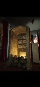 a large wooden room with a fire inside of it at Hotel Transilvania 