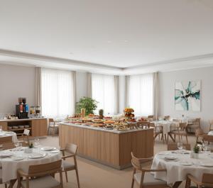 Un restaurante con mesas y sillas y un buffet. en Diyal Alina Apart, en Alejandreta 17 fotos más