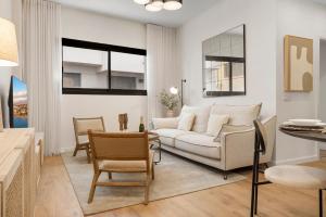 Khu vực ghế ngồi tại Luxury Apartment Centro del Sol