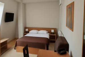 TV a/nebo společenská místnost v ubytování Hotel Topcider