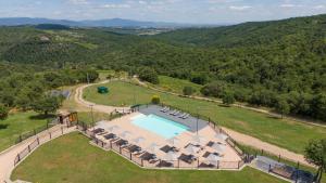 an aerial view of an estate with a swimming pool at Villa Setona by VacaVilla in Bucine