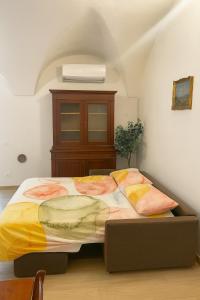 a bedroom with a large bed in a room at Borgo nel Vigneto 1 in Erbusco