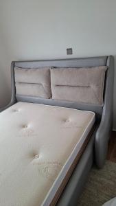 Ένα ή περισσότερα κρεβάτια σε δωμάτιο στο Dynamic Homes