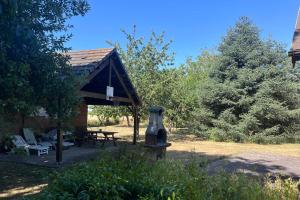 Zahrada ubytování Le chalet des Robins