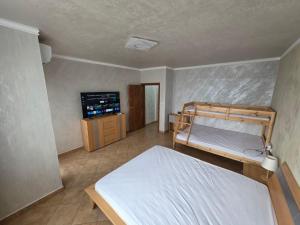 En eller flere senge i et værelse på Апартаменти Ванкови 2