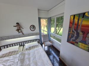 Ένα ή περισσότερα κρεβάτια σε δωμάτιο στο Belverde al Lago +29 φωτογραφίες