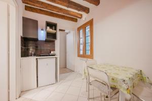 Η κουζίνα ή μικρή κουζίνα στο San Marco Suite - 5 min da San Marco