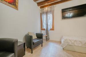 Χώρος καθιστικού στο San Marco Suite - 5 min da San Marco