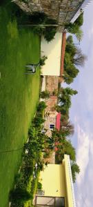 an overhead view of a building with plants and trees at Angel hill resort in Chonp