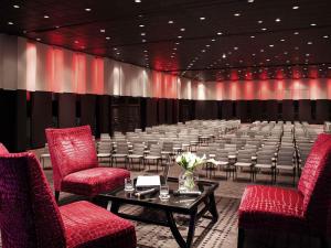 a large room with a large room with chairs and tables at Pullman Cannes Mandelieu in Mandelieu-la-Napoule +138 photos
