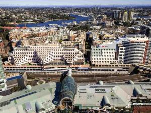 an aerial view of a large city with buildings at Novotel Sydney Darling Harbour in Sydney