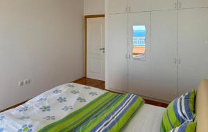 Katil atau katil-katil dalam bilik di Cozy Home In Podstrana