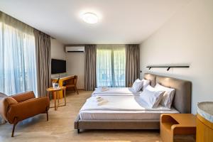 Postel nebo postele na pokoji v ubytování Nik Palas Luxury Residence