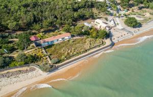 an aerial view of a house on the beach at Lovely Home In Jard Sur Mer With Wifi in Jard-sur-Mer +11 photos