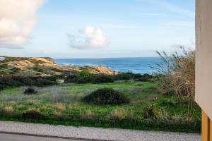 a view of the ocean from a house at Seaview Ensuite rooms in Sagres centre - Casa Maluka in Sagres