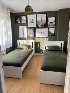 Postel nebo postele na pokoji v ubytování Maison 3 chambres à Lambres Lez Douai