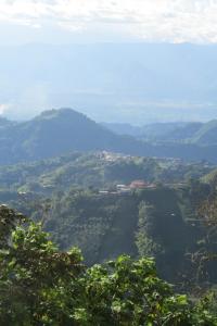 a view of a valley with mountains in the distance at Apartamento en Manizales - Chipre in Manizales