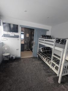 Ένα ή περισσότερα κρεβάτια σε δωμάτιο στο The Hive Great Yarmouth