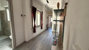 a hallway of a home with a room with a hallway at Centro Città 2 in Gorizia
