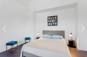 Postel nebo postele na pokoji v ubytování Cìvitas Suite ApartHotel