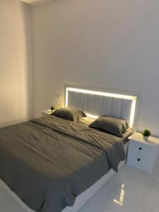 Llit o llits en una habitació de شالية الفاخرة