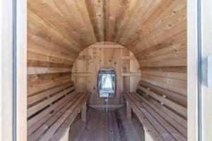 an inside view of a wooden sauna at The Cowboy Social Unit 5 in Williams