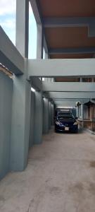 a car parked inside of a parking garage at Ekebute BnB in Mombasa