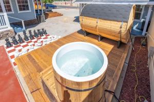 a hot tub on a deck next to a jacuzz at The Cowboy Social Unit 14 in Williams