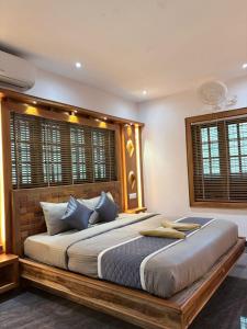 Postel nebo postele na pokoji v ubytování Elephant Valley Resort